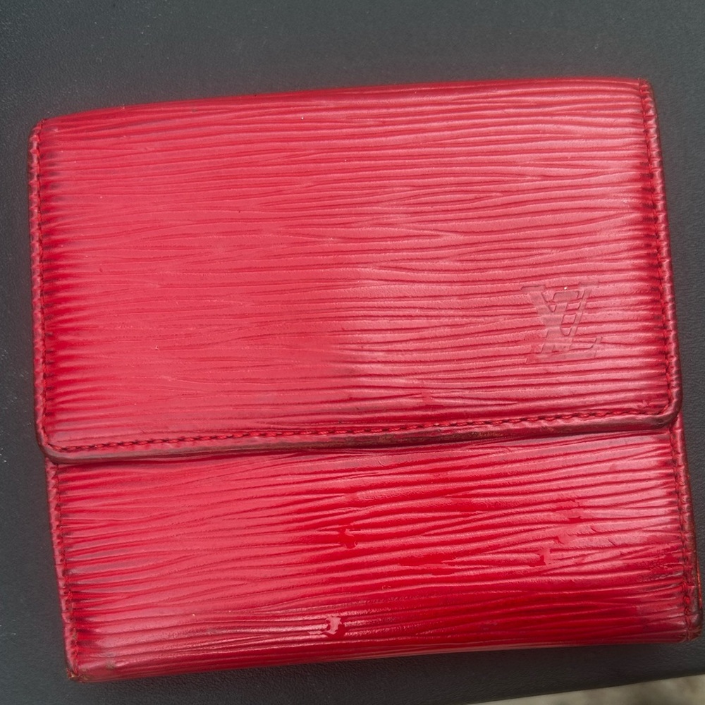 Red Louis Vuitton wallet